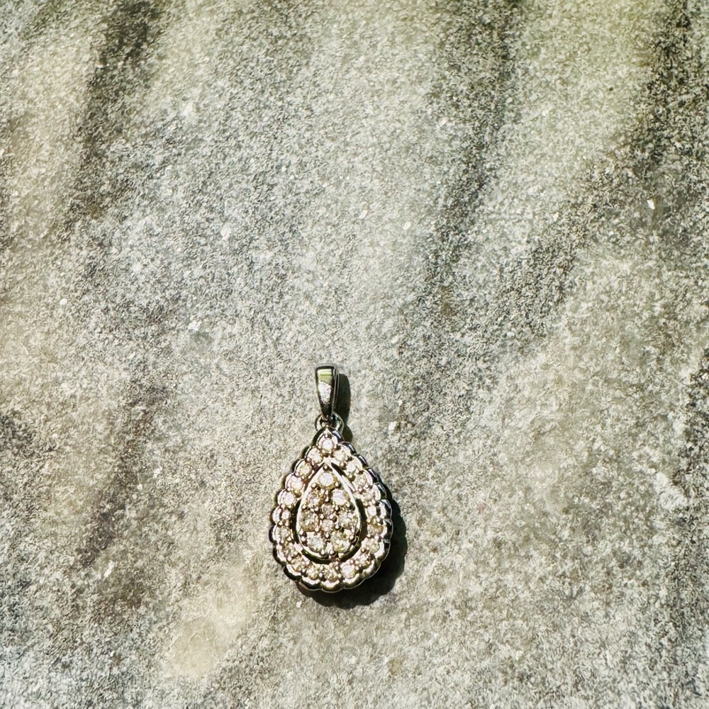 Elegant Sterling Silver and Diamond Teardrop Halo Cluster Pendant.